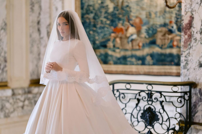 Модель Оливия Калпо показала первые фото со свадьбы с футболистом Кристианом Маккэффри